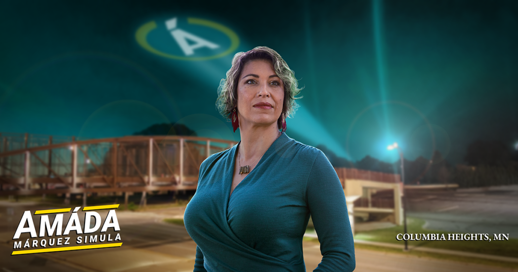 A heroic-looking Amáda Márquez Simula poses by the landmark Columbia Heights foot bridge, while her circular Á logo is projected in the sky behind her.